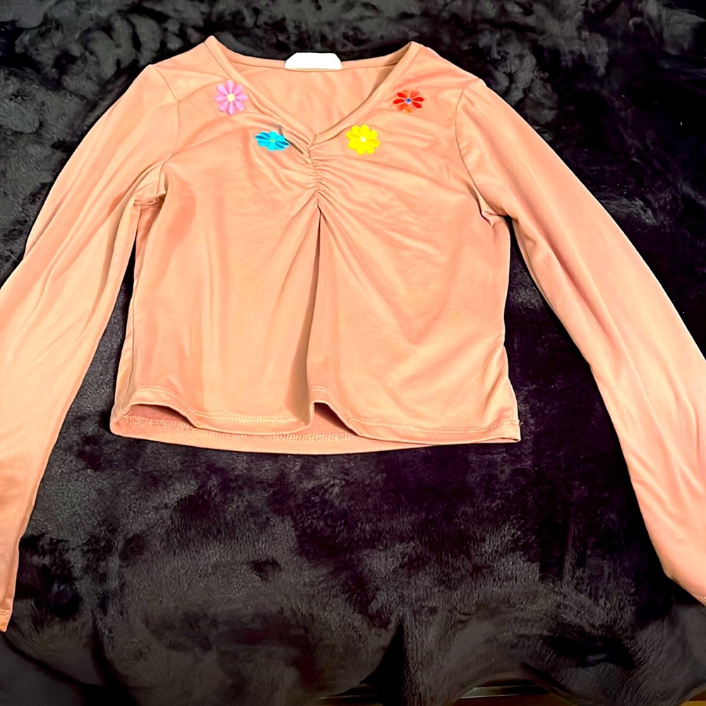Beautees kids long sleeve mauve shirt, size 10 with colored sunflower patches.